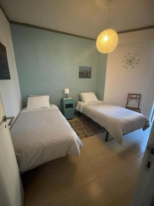 Daloba House Apartment กอสตา ดา กาปาริกา ภายนอก รูปภาพ