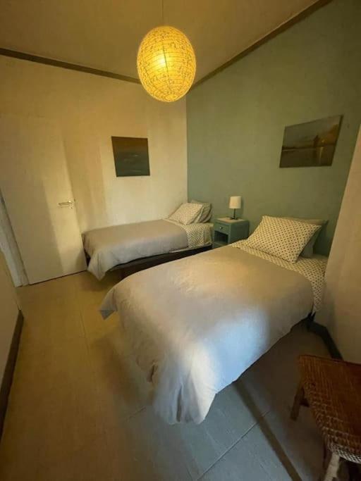 Daloba House Apartment กอสตา ดา กาปาริกา ภายนอก รูปภาพ